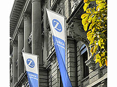 Чистая прибыль Zurich Financial понизилась  на треть